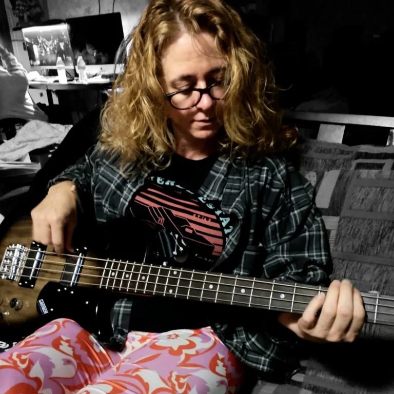 Woman Playing the Bass